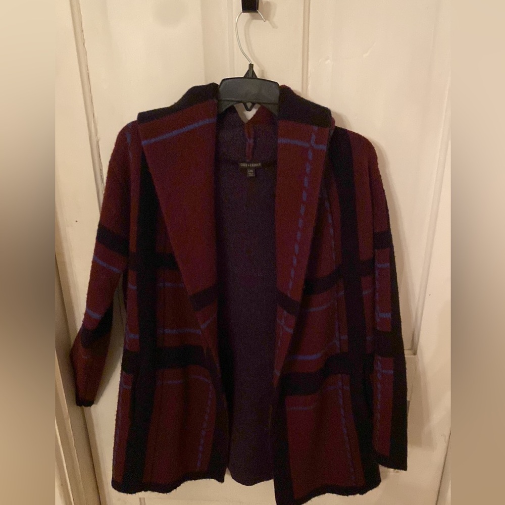 Beautiful warm winter sweater. Lovely plaid with a hood and pockets.